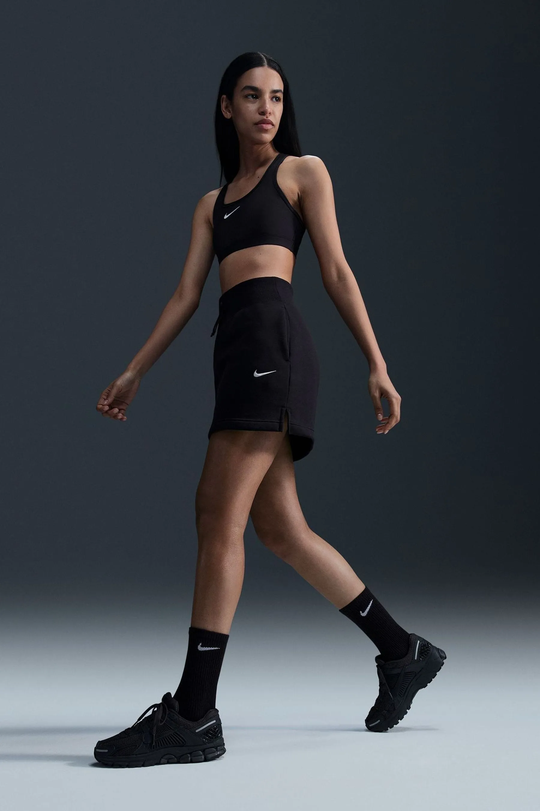 Nike - Reggiseno sportivo imbottito sostegno medio con logo