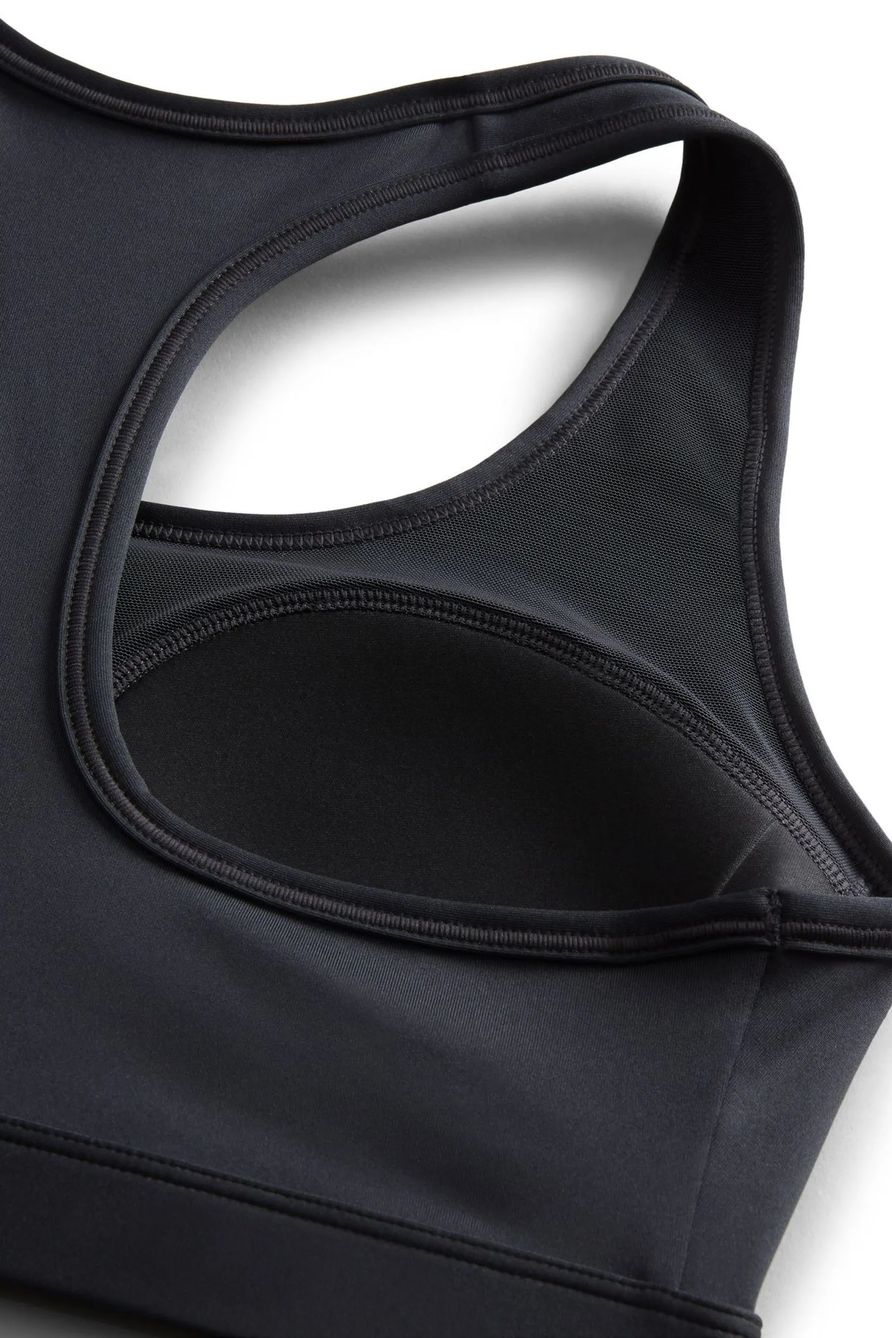 Nike - Reggiseno sportivo imbottito sostegno medio con logo