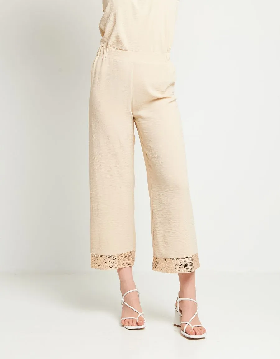 Pantalone palazzo con elastico e bordo