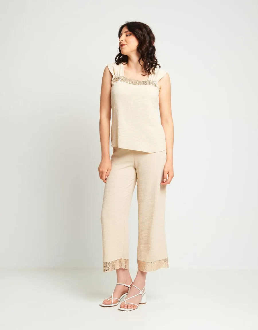 Pantalone palazzo con elastico e bordo