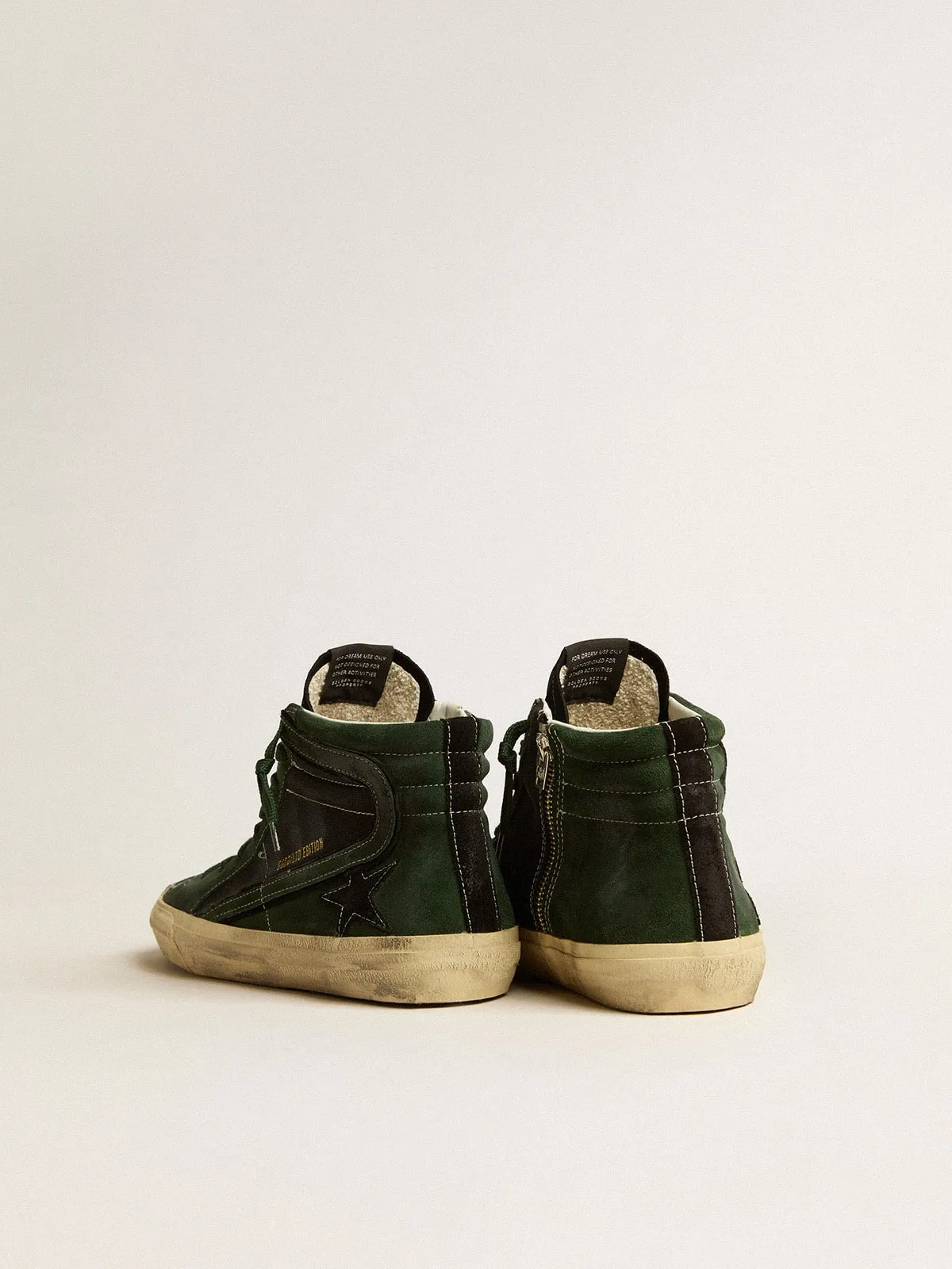 Slide LTD in suede verde e canvas nero con stella e virgola in suede